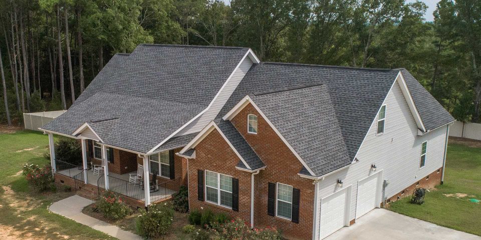 Elevated view of new construction home with red brick exterior built by Wade Construction in Rock Hill, SC