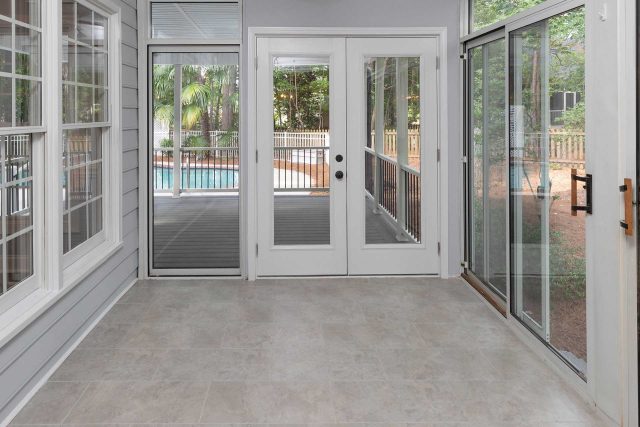 Sun room with tile floor installation by Wade Construction in Rock Hill, SC