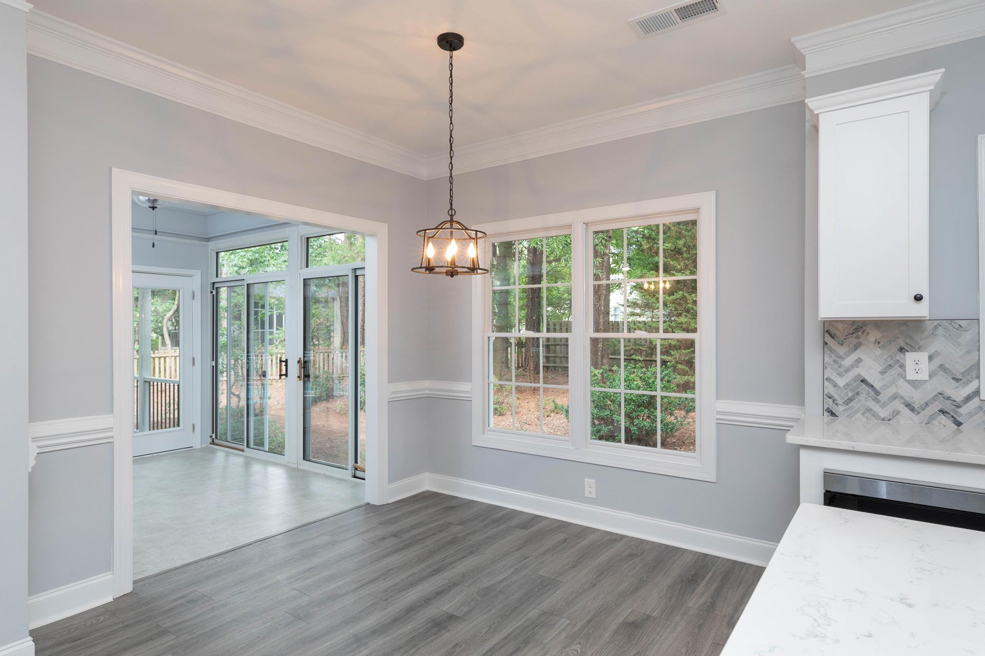 Newly renovated interior with laminate flooring installation by Wade Construction in Rock Hill, SC